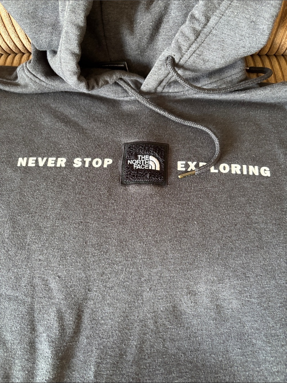 The North Face Men's Gray Crewneck Hoodie with 'Never Stop Exploring' Print